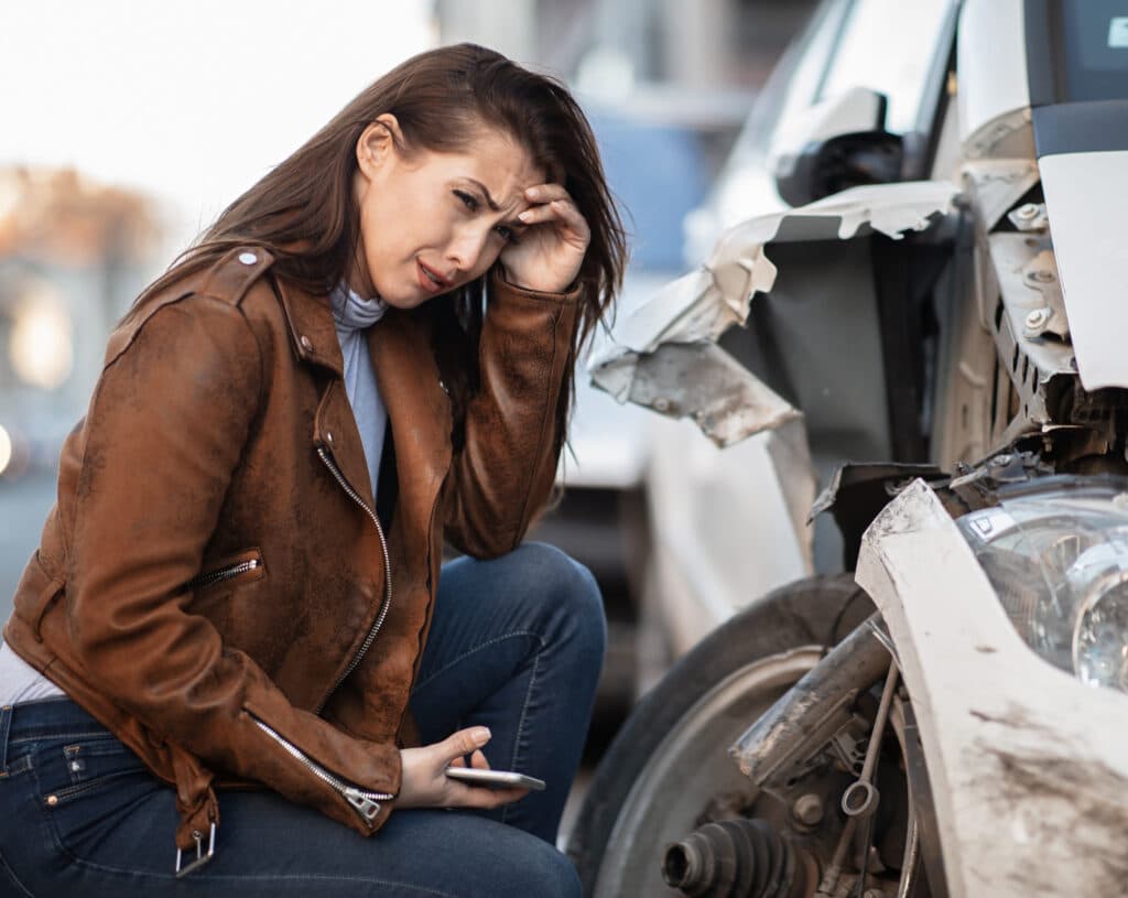 Driver reviewing next steps after a motor vehicle accident